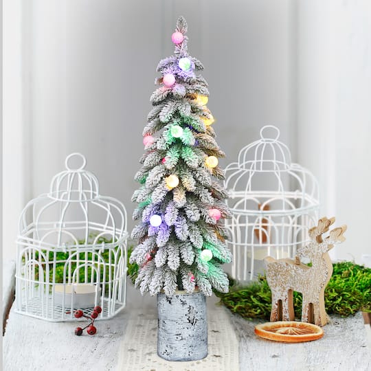 4ft. Pre-Lit Flocked Alpine Artificial Christmas Tree in Decorative Pot, Multicolor LED Lights